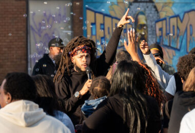 Dee-1 performs at George Floyd Square during the 5th annual Rise and Remember Festival. The festival is held each year on the anniversary of George Floyd's murder.