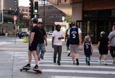 Fans in downtown Minneapolis heading to Target Center for a Minnesota Timberwolves playoff game.