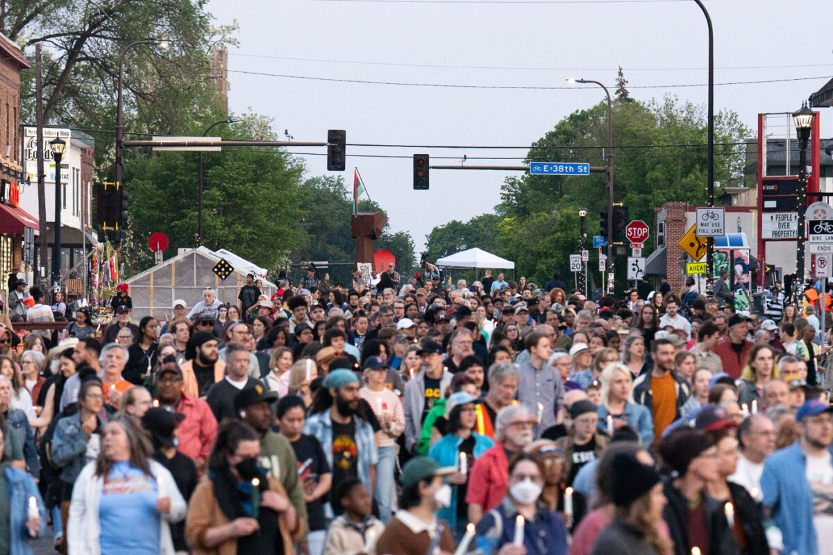 Candlelight vigil walks down Chicago Avenue away from the first towards Say Their Names Cemetery. The vigil happens each year on the 5th anniversary of George Floyd's murder.