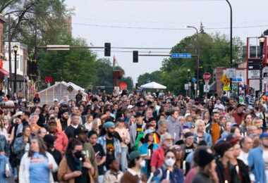 Candlelight vigil walks down Chicago Avenue away from the first towards Say Their Names Cemetery. The vigil happens each year on the 5th anniversary of George Floyd's murder.