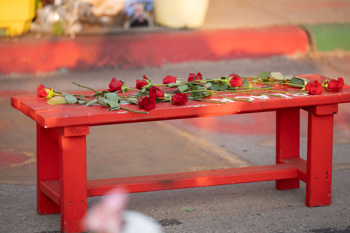 Flowers on bench at the George Floyd Memorial