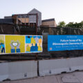 New fence wrap around the burned Minneapolis police station. The police station will eventually be the Minneapolis Democracy Center.