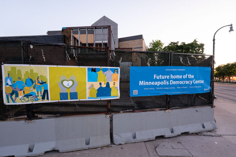Future home of the Minneapolis Democracy Center 4 New fence wrap around the burned Minneapolis police station. The police station will eventually be the Minneapolis Democracy Center.