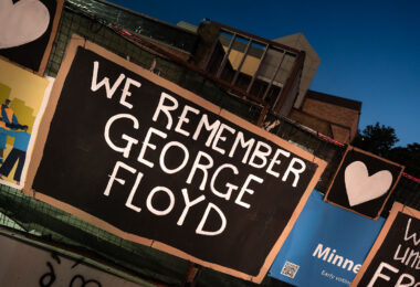 We Remember George Floyd seen on the fencing around the burned Minneapolis police third precinct police station on the 5th anniversary of his murder.