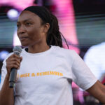 Jeanelle Austin speaks at Rise and Remember 2025 3 Jeanelle Austin, Executive Director of Rise and Remember, speaks at the 5th annual Rise and Remember Festival.The festival takes place every year on the anniversary of George Floyd's murder at George Floyd Square.