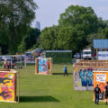 Boards from the Minneapolis Uprising at Phelps Park on the 5th anniversary of George Floyd's murder. 

Memorialize The Movement is an organization that has worked to preserve these boards as historical artifacts.