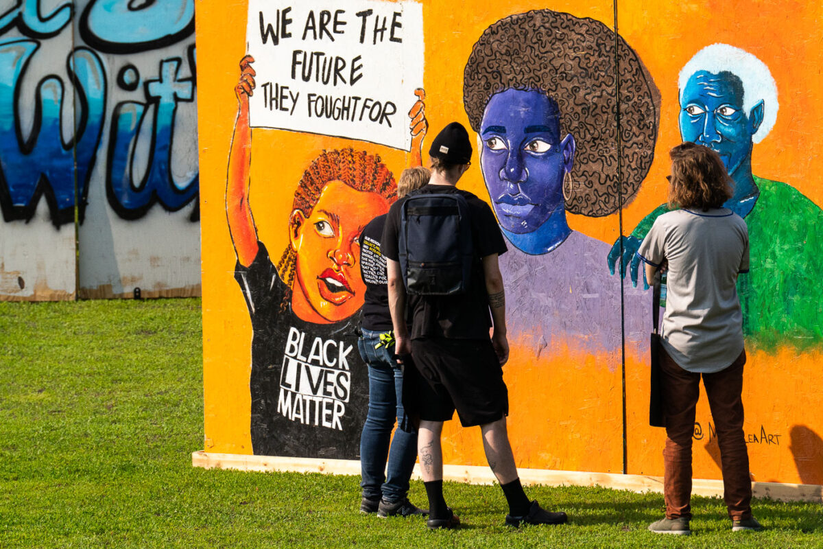 Memorialize The Movement, an organization that saved boards from the Minneapolis Uprising, with them on display at Phelps Park during the 5th anniversary of George Floyd's murder.