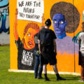 Memorialize The Movement, an organization that saved boards from the Minneapolis Uprising, with them on display at Phelps Park during the 5th anniversary of George Floyd's murder.