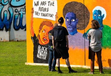 Memorialize The Movement, an organization that saved boards from the Minneapolis Uprising, with them on display at Phelps Park during the 5th anniversary of George Floyd's murder.