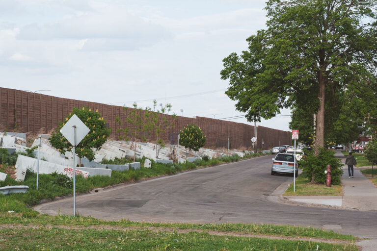 MNDOT Homeless Barriers 1 Concrete barriers setup in the grass on S 9th Street in Minneapolis by MNDOT. The barriers are to prevent camping.