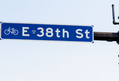 A Murderous Police sticker seen on a street sign at 38th and Chicago on the 5th anniversary of George Floyd's murder.