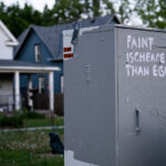 Graffiti in South Minneapolis that reads "Paint is cheaper than eggs".