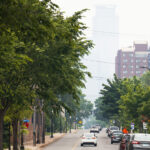 Smokey wildfire air hiding the Capella Tower in Downtown Minneapolis. As seen from the Midtown Greenway.