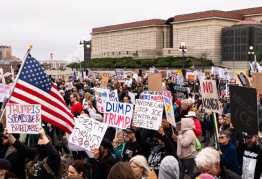 Protesters holding signs reading "Anyone can stop ice with an AR15" "Death to Tyrants" "Abolish ICE" "No Kings".

Despite warnings from the law enforcement not to attend today’s No Kings rally after this mornings shootings of Minnesota lawmakers with the killer on the lose, the No Kings Rally is happening at the Minnesota State Capitol in St. Paul.