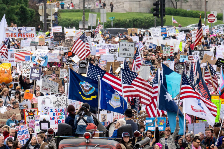 Flags at No Kings protest in Minnesota 4 Despite warnings from the law enforcement not to attend today’s No Kings rally after this mornings shootings of Minnesota lawmakers with the killer on the lose, the No Kings Rally is happening at the Minnesota State Capitol in St. Paul.