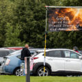 A sign put up outside a Tesla dealership in Minneapolis on June 14, 2025.