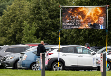 A sign put up outside a Tesla dealership in Minneapolis on June 14, 2025.