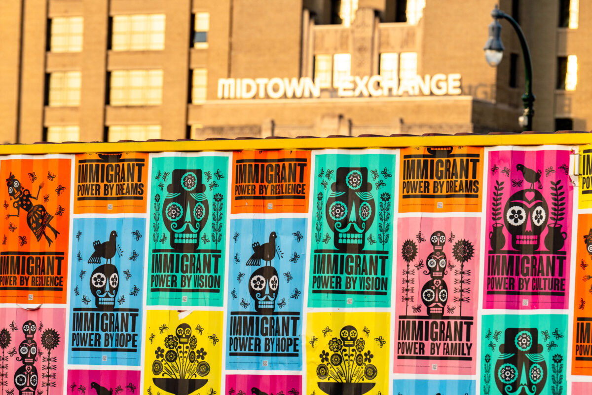 Posters on a shipping container near the Midtown Exchange