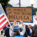 Despite warnings from the law enforcement not to attend today’s No Kings rally after this mornings shootings of Minnesota lawmakers with the killer on the lose, the No Kings Rally is happening at the Minnesota State Capitol in St. Paul.

Protester holds a sign up referring to Minnesota State Representative who along with her husband was shot and killed in her home earlier in the day.
