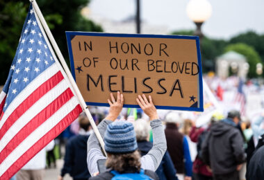 Despite warnings from the law enforcement not to attend today’s No Kings rally after this mornings shootings of Minnesota lawmakers with the killer on the lose, the No Kings Rally is happening at the Minnesota State Capitol in St. Paul.

Protester holds a sign up referring to Minnesota State Representative who along with her husband was shot and killed in her home earlier in the day.