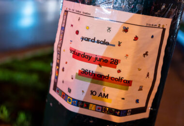 A yard sale sign inspired by Macintosh seen in South Minneapolis.
