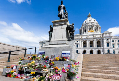 A growing memorial at the Minnesota State Capitol for State Representative Melissa Hortman. 

Hortman was assassinated along with her husband in their home on June 14th. A massive manhunt followed leading to the arrest of Vance Boelter. Boelter is also accused of shooting State Senator John Hoffman and his wife in their home.