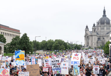 Despite warnings from the law enforcement not to attend today’s No Kings rally after this mornings shootings of Minnesota lawmakers with the killer on the lose, the No Kings Rally is happening at the Minnesota State Capitol in St. Paul.

Protesters march to the State Capitol.