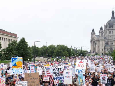No Kings Crowd Marches Past the Cathedral of St. Paul