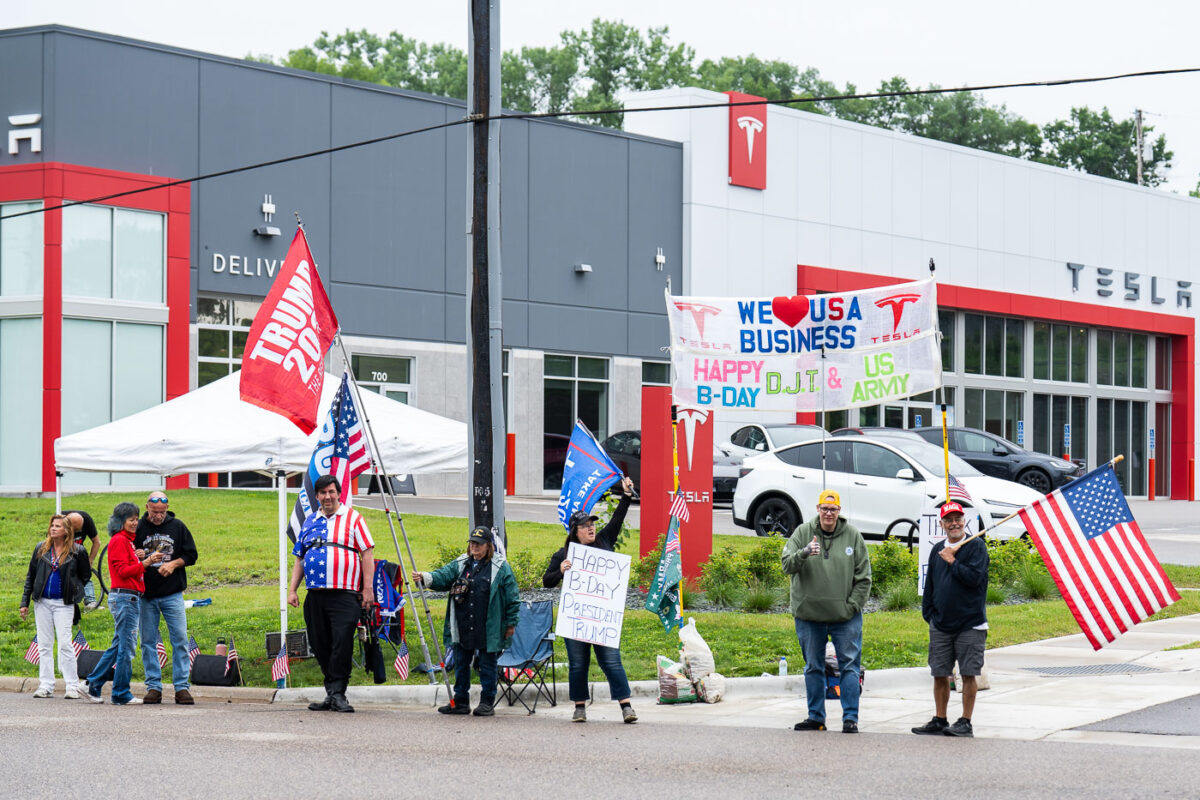 Pro-Trump protesters at a Tesla Takedown event in Golden Valley, Minnesota on June 14, 2025. Some traveling from out of state.