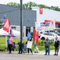 Pro-Trump protesters at a Tesla Takedown event in Golden Valley, Minnesota on June 14, 2025. Some traveling from out of state.