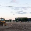 Dirt and work trucks on Nicollet Ave making a road