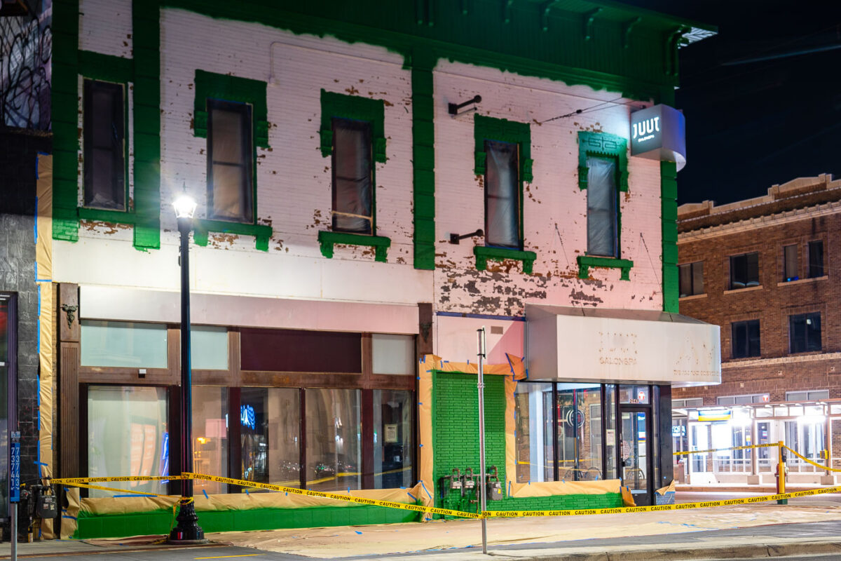 New green painting on what is to become a dispensary in the former Juut Salon space at Hennepin and Lake street in Uptown Minneapolis.