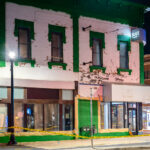 New green painting on what is to become a dispensary in the former Juut Salon space at Hennepin and Lake street in Uptown Minneapolis.