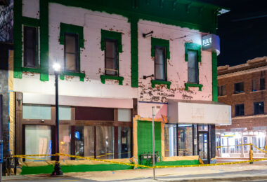 New green painting on what is to become a dispensary in the former Juut Salon space at Hennepin and Lake street in Uptown Minneapolis.