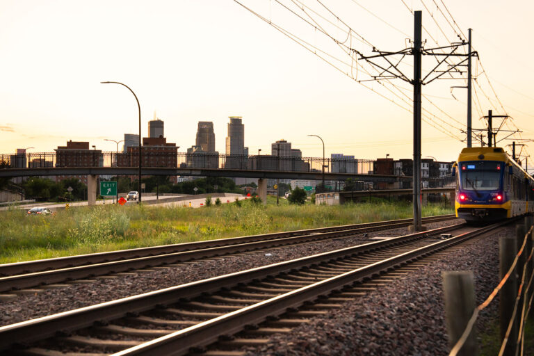 Metro Transit train during a sunset in Minneapolis 4 A Metro Transit train heading out of Downtown Minneapolis during a July 2025 sunset.
