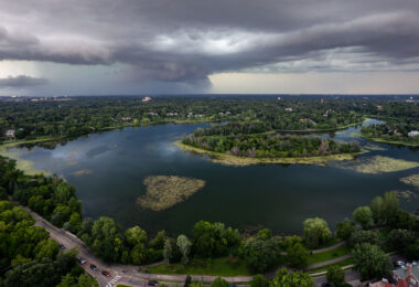 A large thunderstorm rolling in over Lake of the Isles in Minneapolis in July 2025.