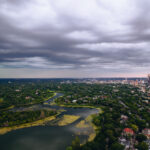 Large thunderstorms move in during a weather warning over Lake of the Isles. Downtown Minneapolis visible.