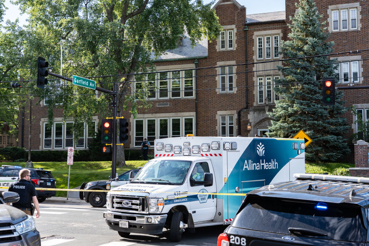 An ambulance at Annunciation Catholic School and church in Minneapolis on August 27, 2025 following a mass shooting that killed 2 children and injured 17 others, 14 of them children.