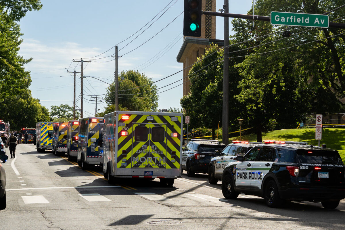 Police at Annunciation Catholic School in Minneapolis on August 27, 2025 following a mass shooting that killed 2 children and injured 17 others, 14 of them children.