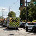 Police at Annunciation Catholic School in Minneapolis on August 27, 2025 following a mass shooting that killed 2 children and injured 17 others, 14 of them children.
