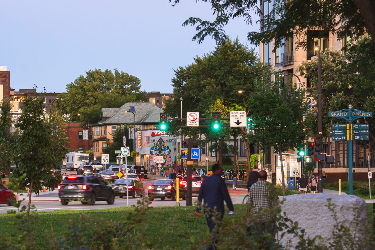 Walkers around Lake Street and Bde Maka Ska in Uptown Minneapolis.