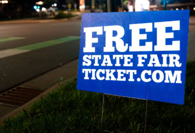 Yard signs giving away Minnesota State Fair tickets. There's a catch: the tickets given away by Creative Church in Maple Grove, require you to attend a church service first.