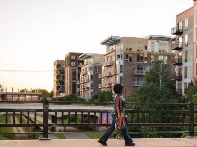 Woman on Emerson Ave Bridge, Midtown Greenway, Uptown