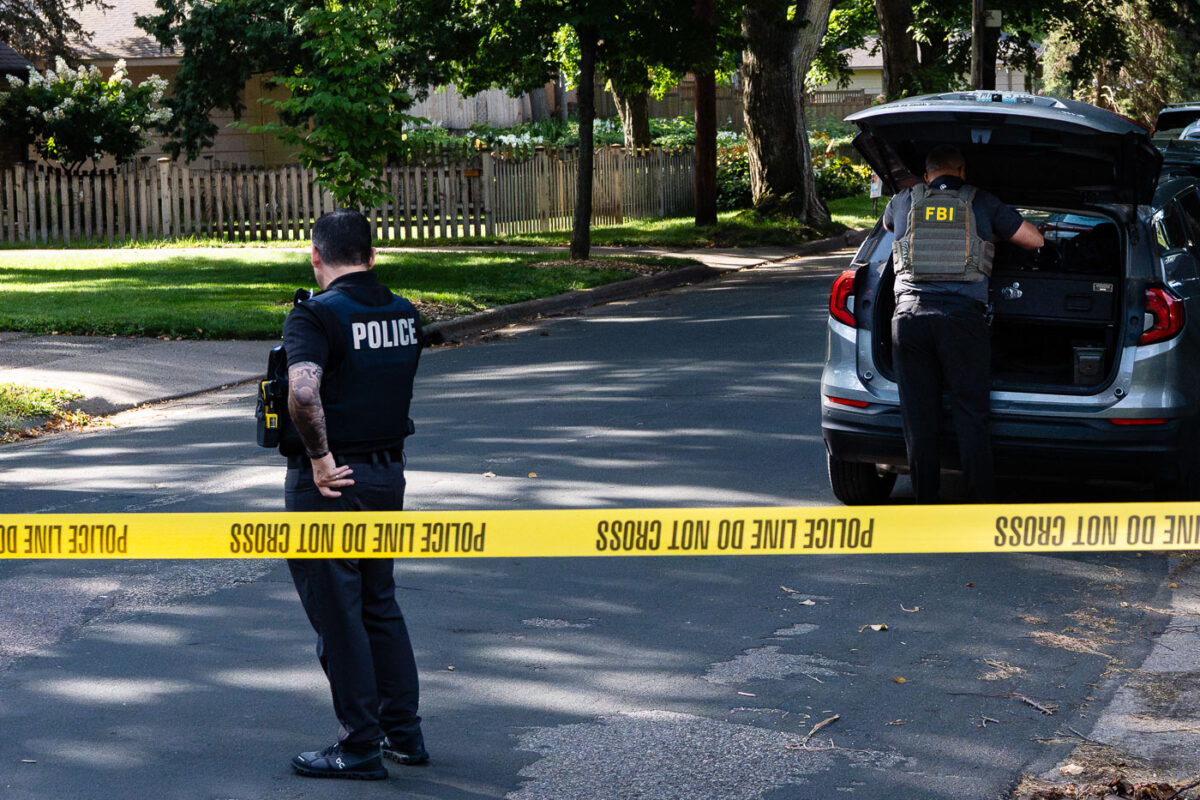 Police at Annunciation Catholic School and Church in Minneapolis on August 27, 2025 following a mass shooting that killed 2 children and injured 17 others, 14 of them children.