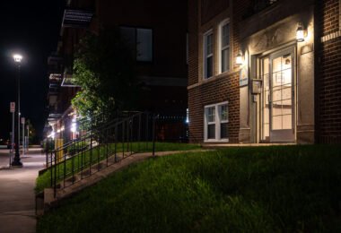 Apartment building on Holmes Ave in Uptown Minneapolis at night.