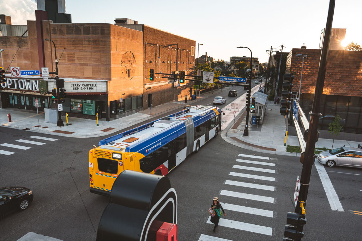 A Metro Transit B-Line bus crosses Hennepin Avenue in Uptown Minneapolis.