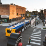 A Metro Transit B-Line bus crosses Hennepin Avenue in Uptown Minneapolis.