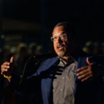 MN Attorney General Keith Ellison at Vigil 3 The Minneapolis community gathered at Lynnhurst Park last night for a vigil following the mass shooting at Annunciation School and Church earlier in the morning. 2 children were killed and 17 others injured. The crowd heard from speakers ranging from the Minnesota Attorney General, Minneapolis Mayor and City Council Members, and Congresswomen.