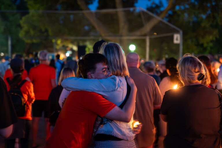 Mourners hug at a vigil in Minneapolis 2 The Minneapolis community gathered at Lynnhurst Park last night for a vigil following the mass shooting at Annunciation School and Church earlier in the morning. 2 children were killed and 17 others injured. The crowd heard from speakers ranging from the Minnesota Attorney General, Minneapolis Mayor and City Council Members, and Congresswomen.