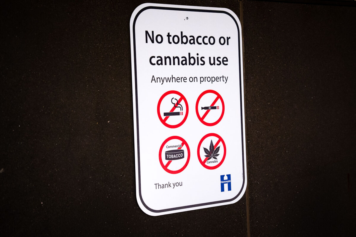 A "no tobacco or cannabis use Anywhere on property" sign at a Hennepin County Library.